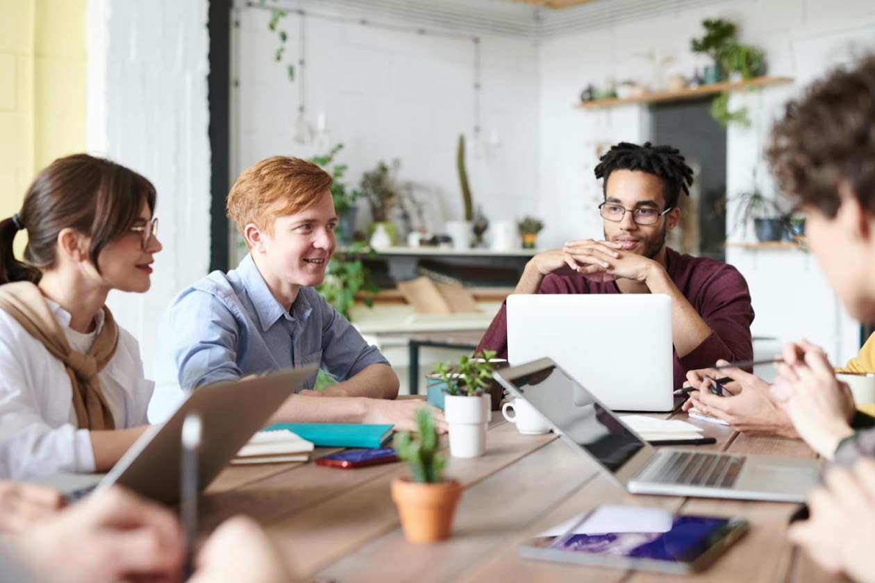 Creative team at work in an agency: laptops, sticky notes and brainstorm &mdash; marketing creativity crisis 2026